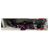 Shelf lot of patriotic decor, candles and mat