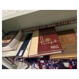 Vintage assorted year books, jim thorpe poster