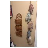 Hanging wicker storage and porcelain fish decor