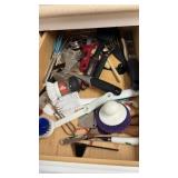 Drawer of Kitchen Utensils and Scrub Brushes