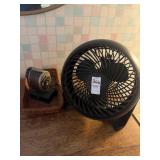 Desk fan, pencil sharpener, and basket