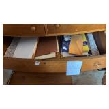 Contents of drawer - paper, clipboards, folders