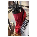 Tour Edge SP1 iron set with a red golf bag