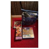 Lot of assorted puzzles and fake axe