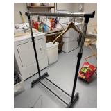 Portable clothing rack with hangers