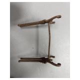 Vintage cast iron dual boot rack ?