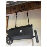 Walk behind push drop spreader