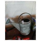 Vintage galvanized watering can