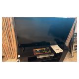 TCL LED flat screen TV with remote and golf