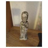 Bookend, mirror, and small figure