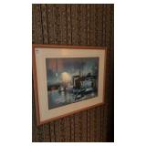 Framed watercolor painting of a cloudy harbor
