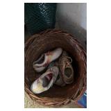 Wooden basket of Footjoy and eMerge golf shoes