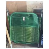 Green folding chair