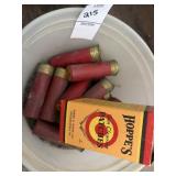 Vintage shotgun shells and gun cleaning patches