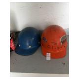 Lot of hard hats, roach and ant killer, and fire