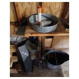 Misc contents of left garage corner, chains, wood
