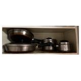 Shelf lot of pots and pans