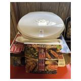 George Foreman lean meat grilling machine and