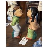 Ceramic Asian boy and girl kissing figurines made