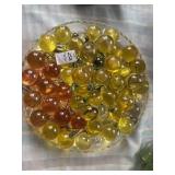 Vintage loose lucite grapes on glass plate