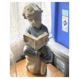 Vintage porcelain boy reading a book statue
