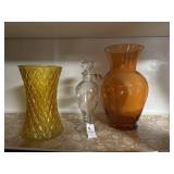 Lot of colored vases and avon beauty bottle