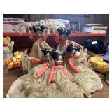 Decorative oriental dolls on wooden base
