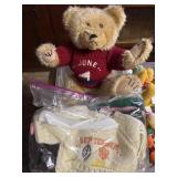 Teddy bear with monthly reversible sweaters