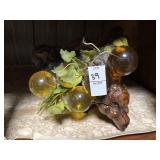 Vintage grape cluster on wood