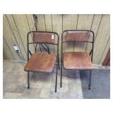 2 metal folding chairs