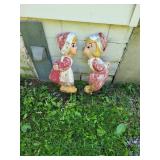 Vintage Dutch boy &Girl kissing cement