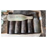 Lot of 6 vintage glass bottles from V.A. Oswalo