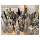 Large lot of vintage marked glass bottles
