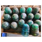 Flat of glass insulators