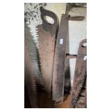 2 vintage crosscut logging handsaws