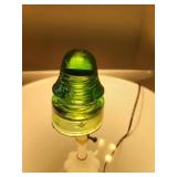 Green glass insulator with a star