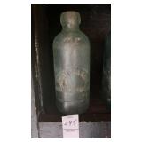 Antique green glass Hutchinson style soda bottle