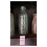 Antique green glass Hutchinson style soda bottle