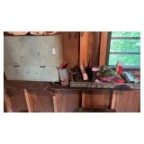 Green wooden storage cabinet with grass seed and