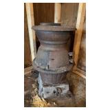 Antique cast iron pot belly stove