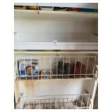 2 shelves of misc, broken Coke bottle, Cd