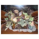 Seashell arrangement in box and mermaid figurine