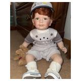 Porcelain doll with dog wearing Calvin Klein and