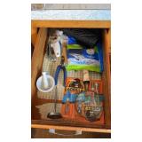 Drawer of Gorilla Glue and Household Items