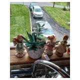 Lot of figures and faux plant
