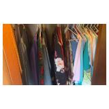 Lot of Clothing in Closet