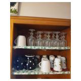 2 shelves of cups and glasses some Lenox