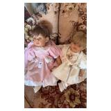 Two collectible vinyl artist dolls