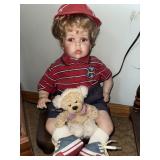 Porcelain racing champ doll on stool