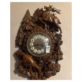 Plastic battery operated forest clock with deer